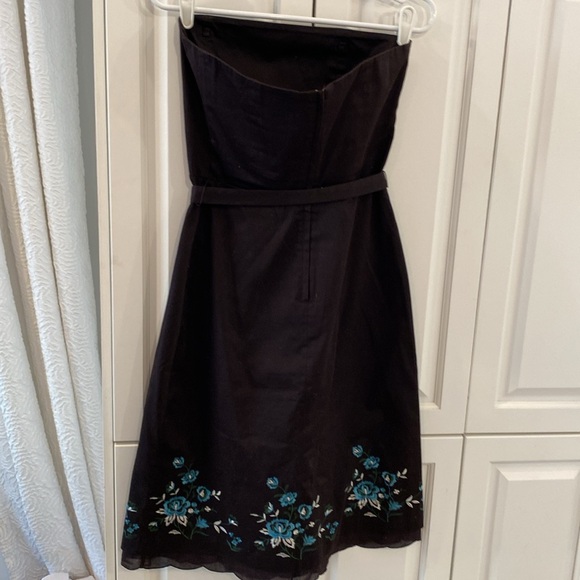 RW&CO strapless dress. Beautiful embroidery on the bottom. Slip underneath. - Picture 3 of 4